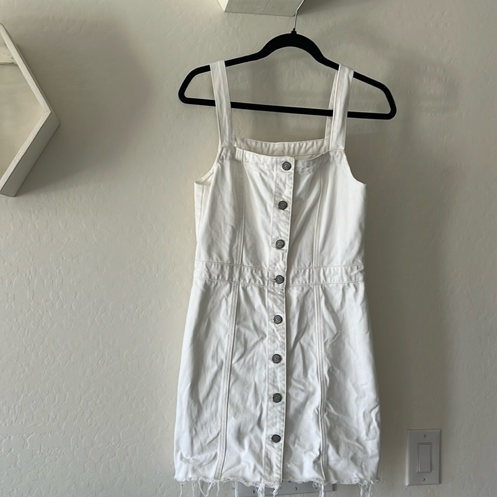 White jean mini dress. With silver buttons